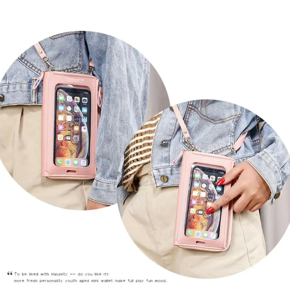 A pink multi-color crossbody cell phone bag is shown being worn on a denim jacket and light colored shirt.