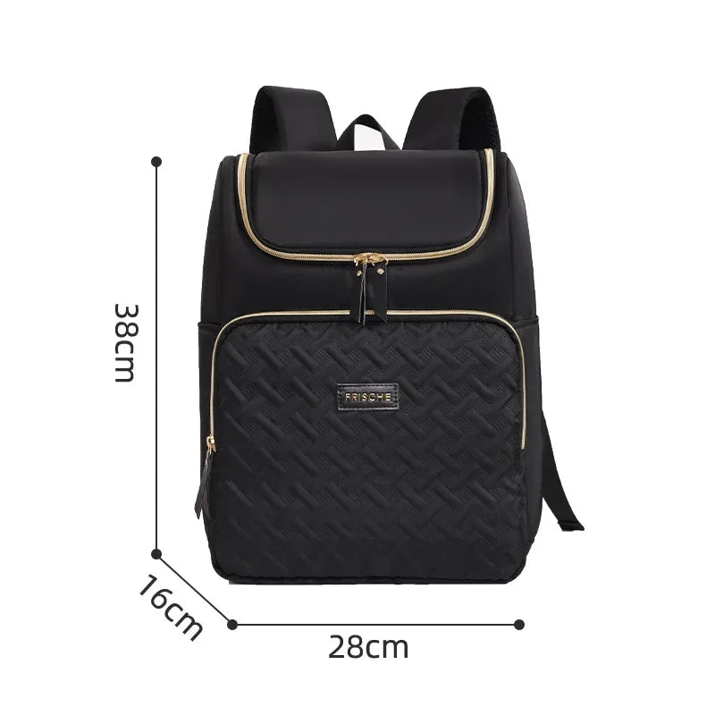 Black insulated travel backpack with gold trim and quilted pattern