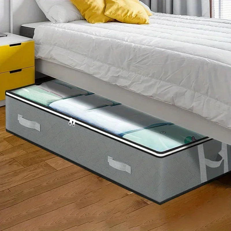 A dustproof under bed storage box with reinforced handles is shown on a wooden floor next to a white bed frame.