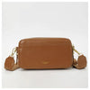 A brown leather tote bag with a signature letter detail and matching leather strap.