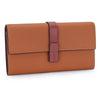 A brown genuine cow leather bifold wallet with a stitched edge and a leather strap.