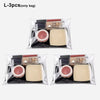 Three cosmetic or tool organizers in a clear plastic bag, showing various shades and textures.