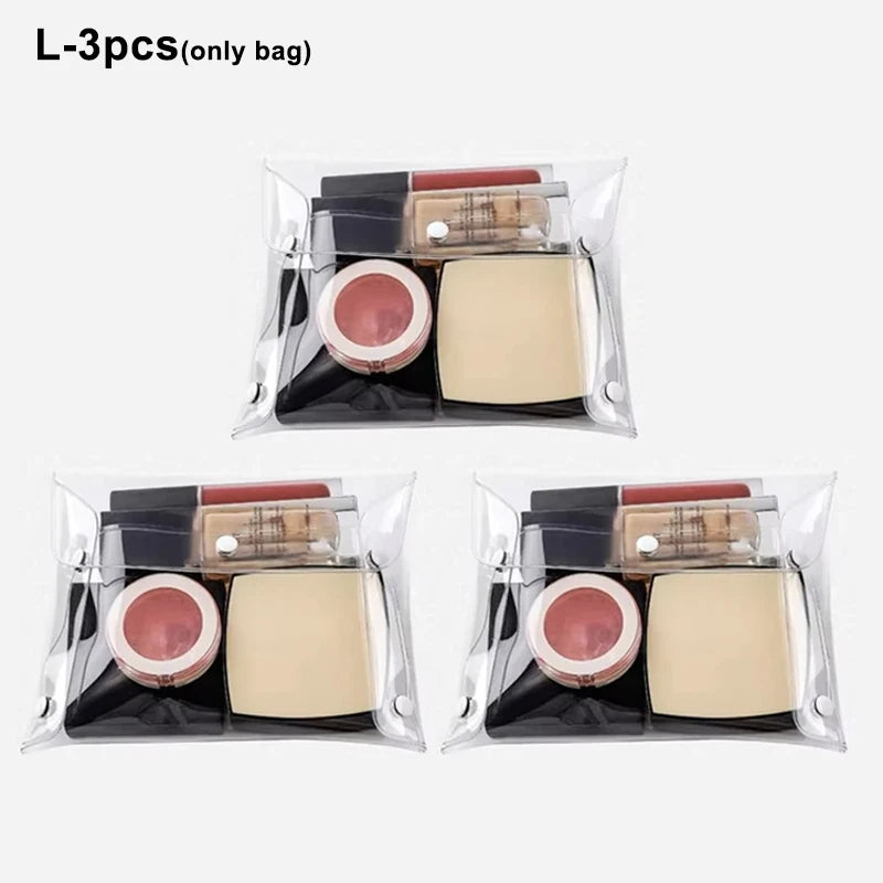 Three cosmetic or tool organizers in a clear plastic bag, showing various shades and textures.