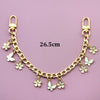 Gold chain necklace with bag flower pearl charms, measuring 26.5cm.