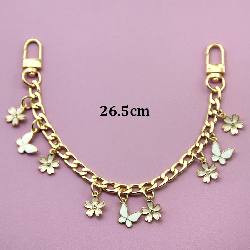 Gold chain necklace with bag flower pearl charms, measuring 26.5cm.