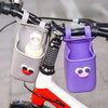 A close-up of a purple silicone cup holder attached to a bicycle handlebar.