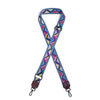 A colorful retro textile replacement bag strap with a geometric pattern and leather ends.
