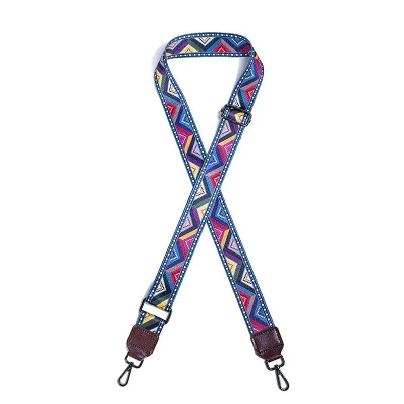 A colorful retro textile replacement bag strap with a geometric pattern and leather ends.
