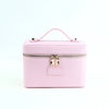 A pink PU leather makeup bag with a zipper and a loop handle.