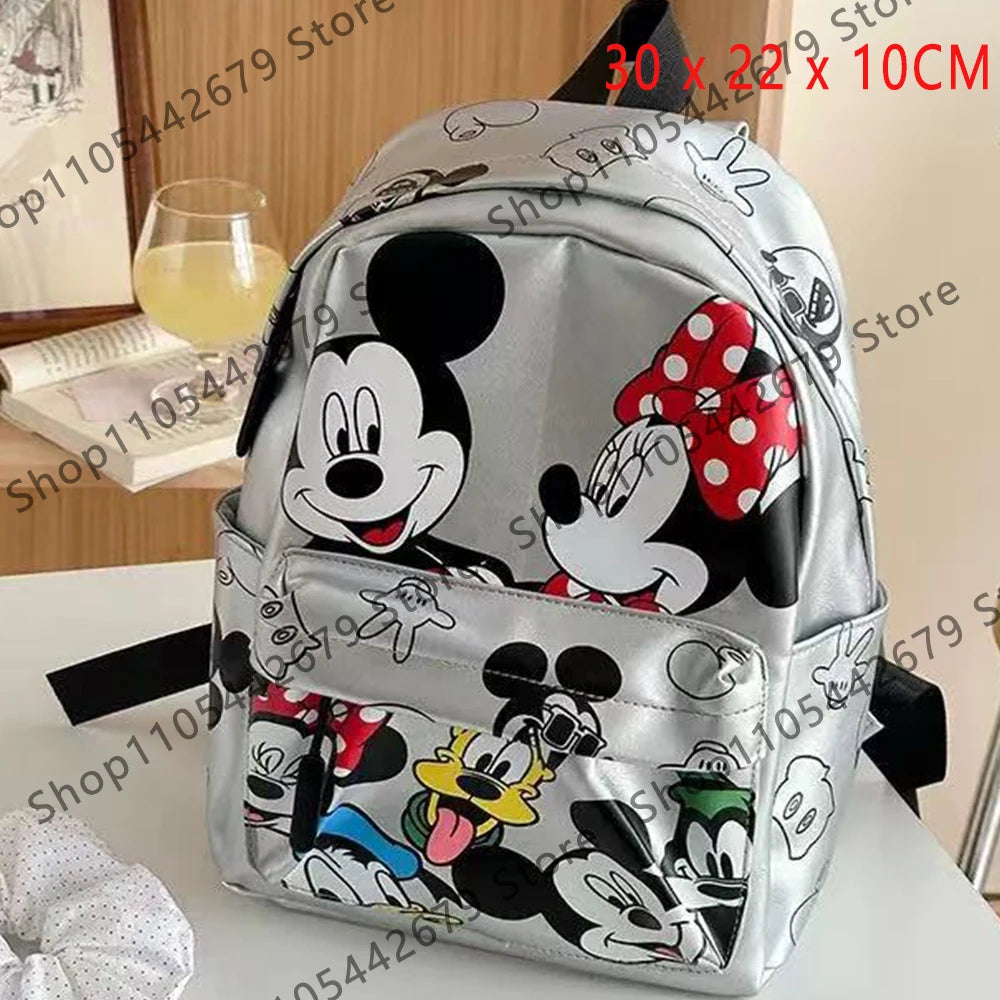 Mochila de peluche plateada con dibujo de ratón y pato, personajes de Mickey y Donald