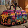 A colorful quilted travel duffle bag featuring a vibrant floral and nature pattern.