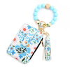 A light blue silicone bead bracelet attached to a PU leather key chain wallet with a floral pattern.