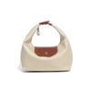 A beige waterproof nylon crossbody bag with dual brown leather straps.