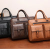 Three brown and black men's PU leather business briefcase bags displayed on a wooden surface.