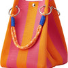 A striped knit bucket tote bag in shades of orange and pink with blue leather accents.