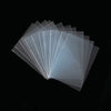 A fan of transparent card sleeves showing various shades of clear and light gray protectors.