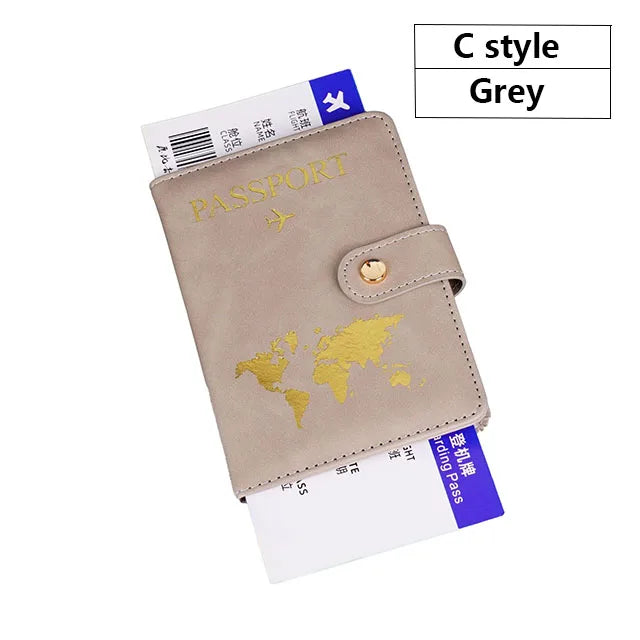 A C style grey passport and ID holder cover made of premium PU leather with a gold foil map design.