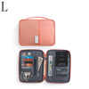 A salmon-colored multi-pocket waterproof travel document organizer with a hinged cover and interior pockets.