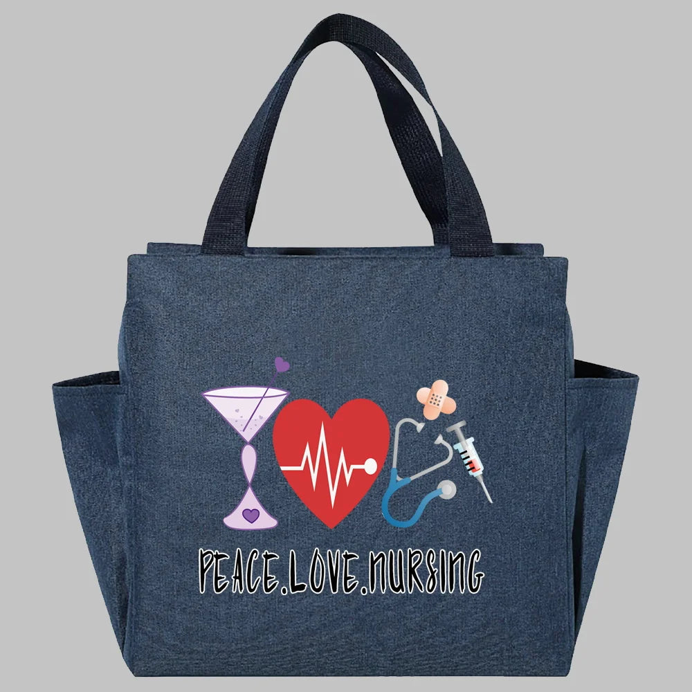 Bolsa de almuerzo de lona azul oscuro con un corazón rojo y una línea de ECG y el texto Peace Love Nursing