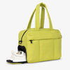 A lime green large capacity women's travel duffle bag with padded straps and a black lining.
