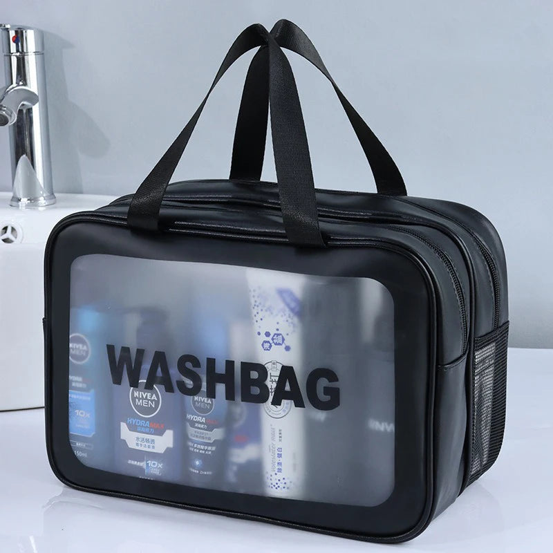 A black travel toiletry bag with a clear window showing various personal care products.