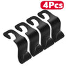 Four black car seat back hooks for trunk organization
