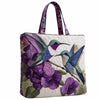 Bolso de tela acolchado vintage con estampado floral morado y verde sobre fondo blanco.