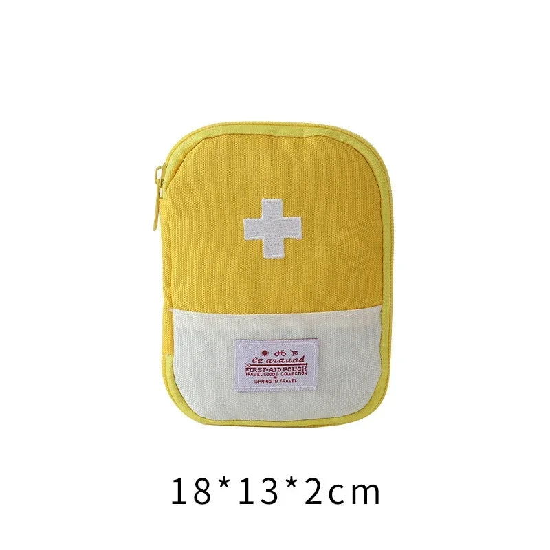 A yellow pouch-style storage bag for a first aid kit with a white cross symbol on the front.