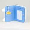 Light blue anime trifold zipper wallet with a yellow charm and an ID window