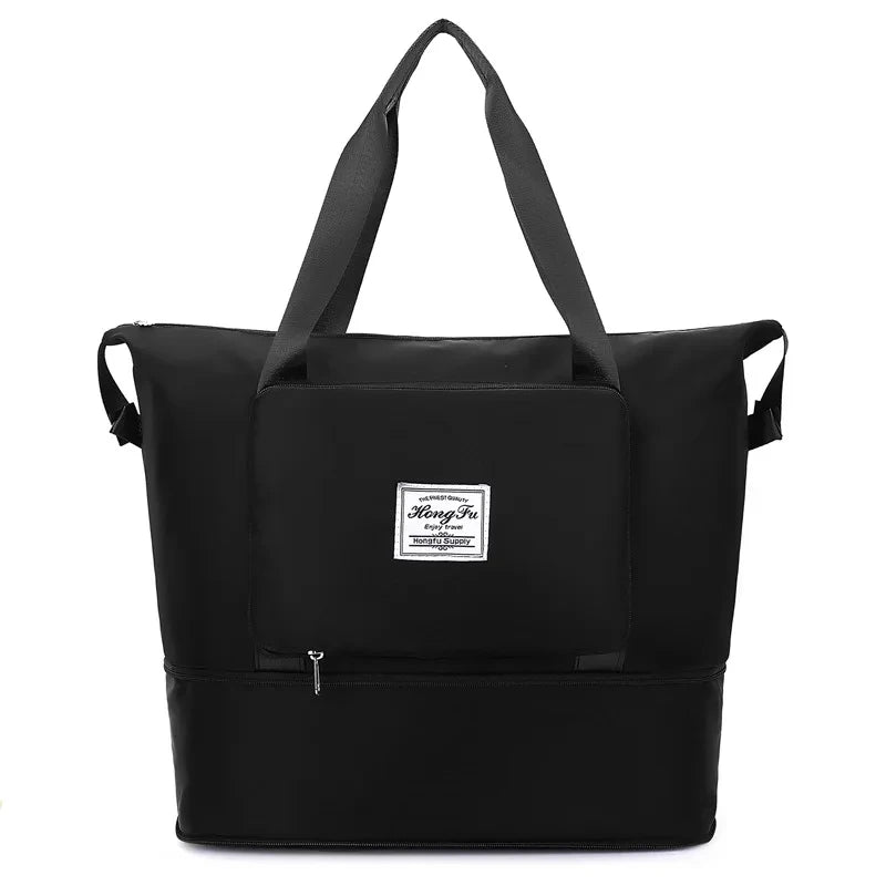 Black expandable travel organizer bag with handles and a zipper pocket