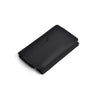 A black magnetic foldable ID card holder and coin purse shown from above.