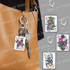 A keychain featuring Deltarune chibi poker cards attached to a brown leather handbag.