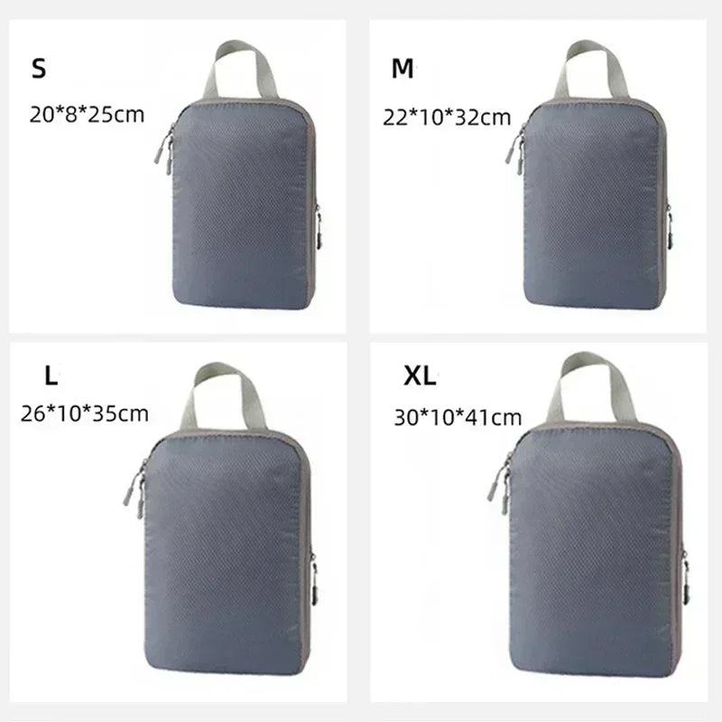 A set of four travel compression packing cubes in gray fabric, shown in sizes S, M, L, and XL.