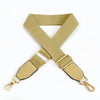 A beige canvas cotton bag strap with metal hooks shown in an 'X' shape.