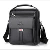 Black vintage PU leather crossbody messenger bag with a top handle and leather strap.