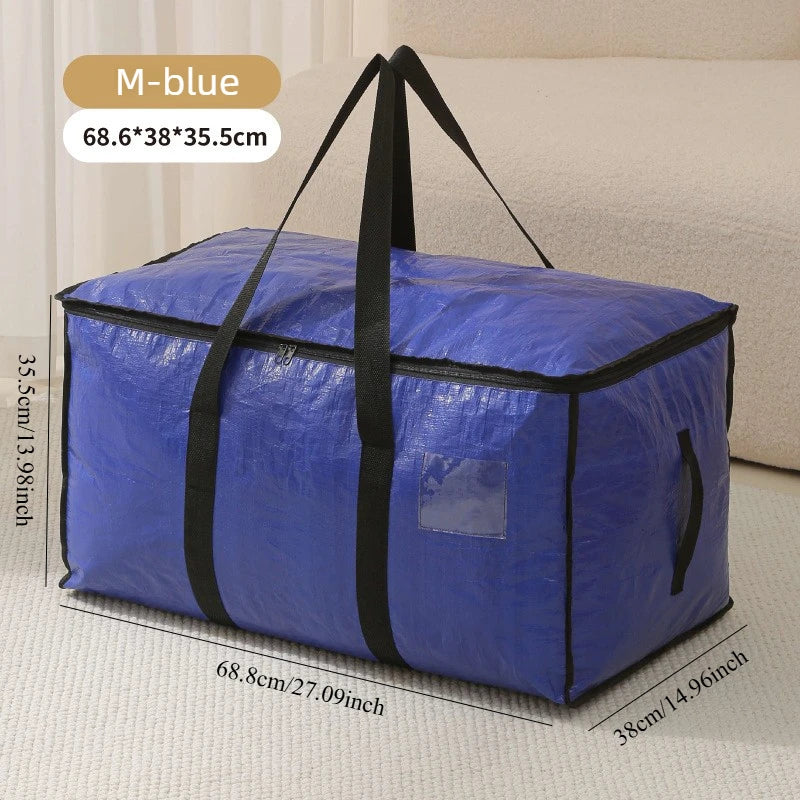 A blue woven storage bag with black straps and double zippers shown lying on a light surface.