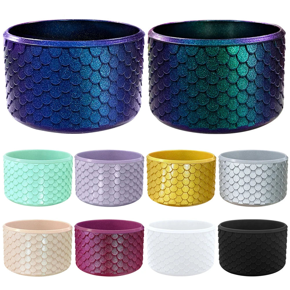 A collection of silicone boot sleeves in various colors including blue, green, purple, yellow, pink, white, and black.