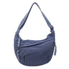 Dunkelblaue Nylon-Crossbody-Tasche mit Schnürverschluss.