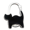 Silver hoop shaped like a black cat silhouette used as a portable handbag hook