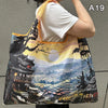 A reusable shopping tote bag featuring a watercolor-style illustration of traditional Japanese architecture and landscape.