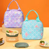 A light blue backpack with a purple scale pattern is shown next to small pink and green storage containers.