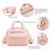 Pink quilted mommy bag with a strap and mesh pockets for organizing baby items