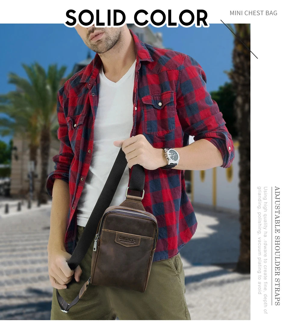 A man models a brown leather crossbody bag against a sunny outdoor background.