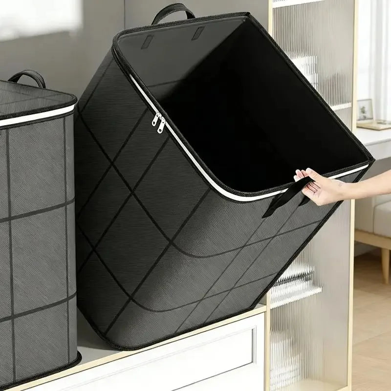 A black foldable storage organizer bag is shown open, being held by a hand, next to a glass shelf.
