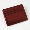 A rectangular, reddish-brown faux leather card holder with embossed lines.