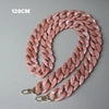 A long, pink acrylic resin chain strap measuring 120cm is displayed on a gray background.