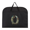 Black fabric dust cover and storage bag with an ornate gold and teal design.