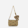 A beige fabric bow bag with a chain strap and a fabric bow detail.