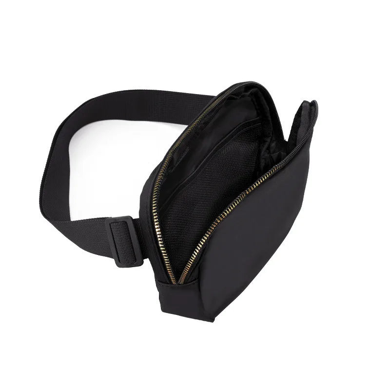 Black waist bag or fanny pack with a zipper and adjustable strap.