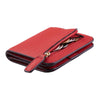 A red leather compact bi-fold wallet with a gold-toned zipper and visible coins inside.